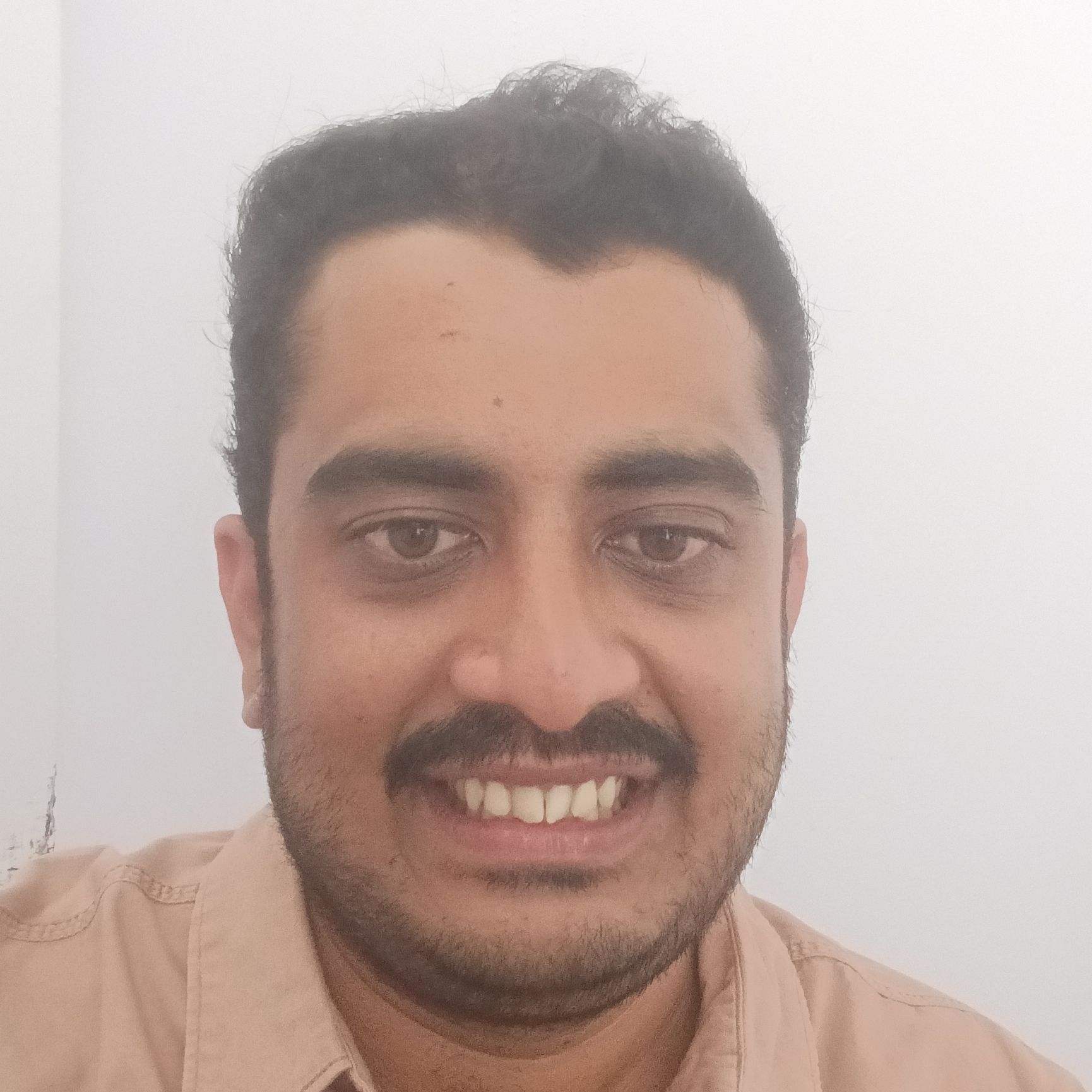 Dr. Ganesh M