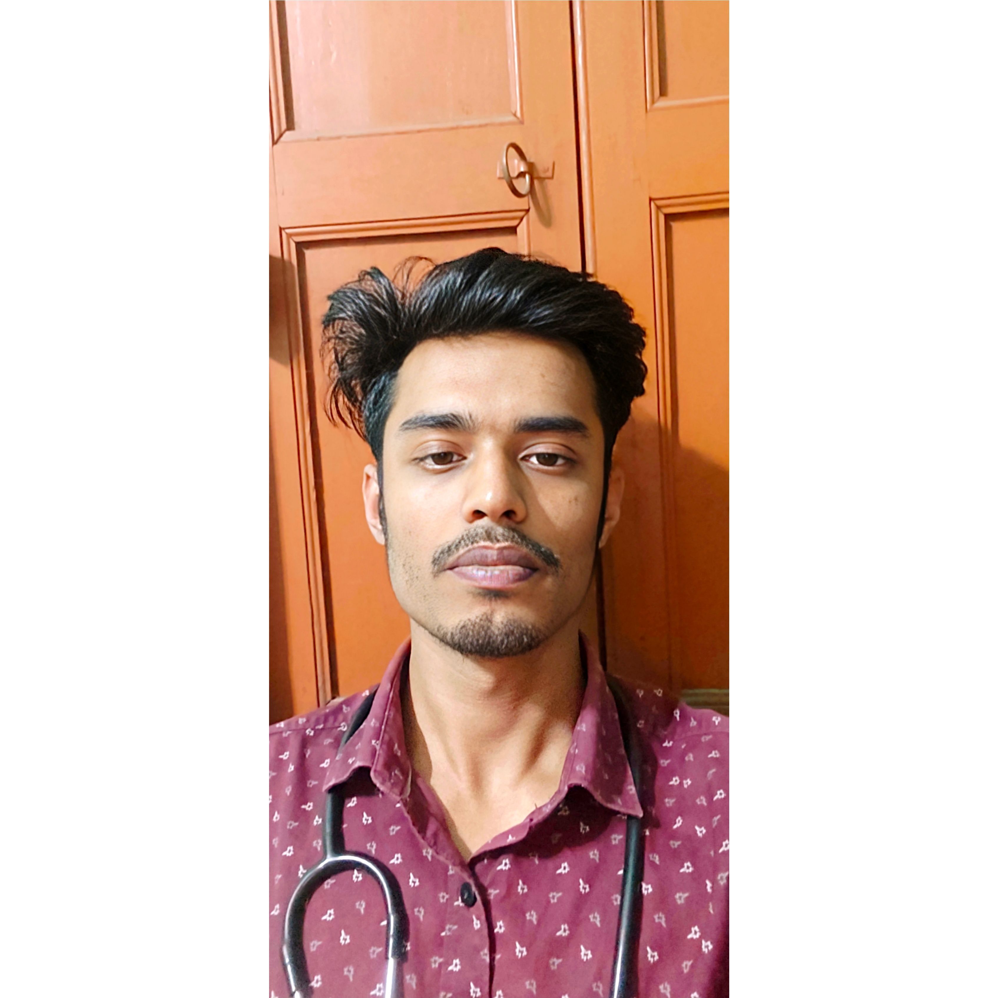 Dr. Trambak Chatterjee
